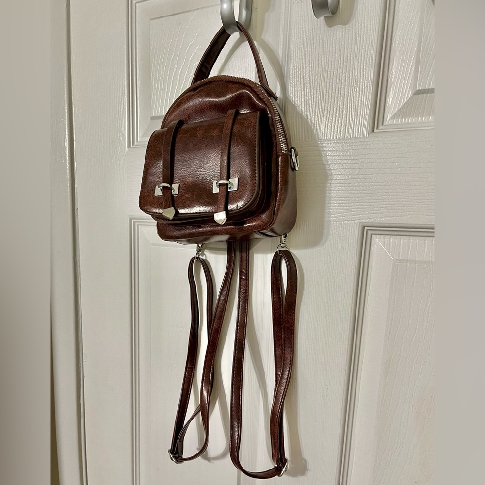 Leather zip front flop bag